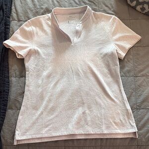 Women’s Nike light pink golf shirt- size S.